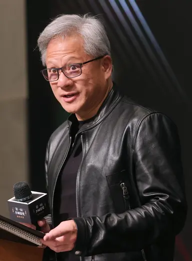 Jensen Huang speaking at a podium